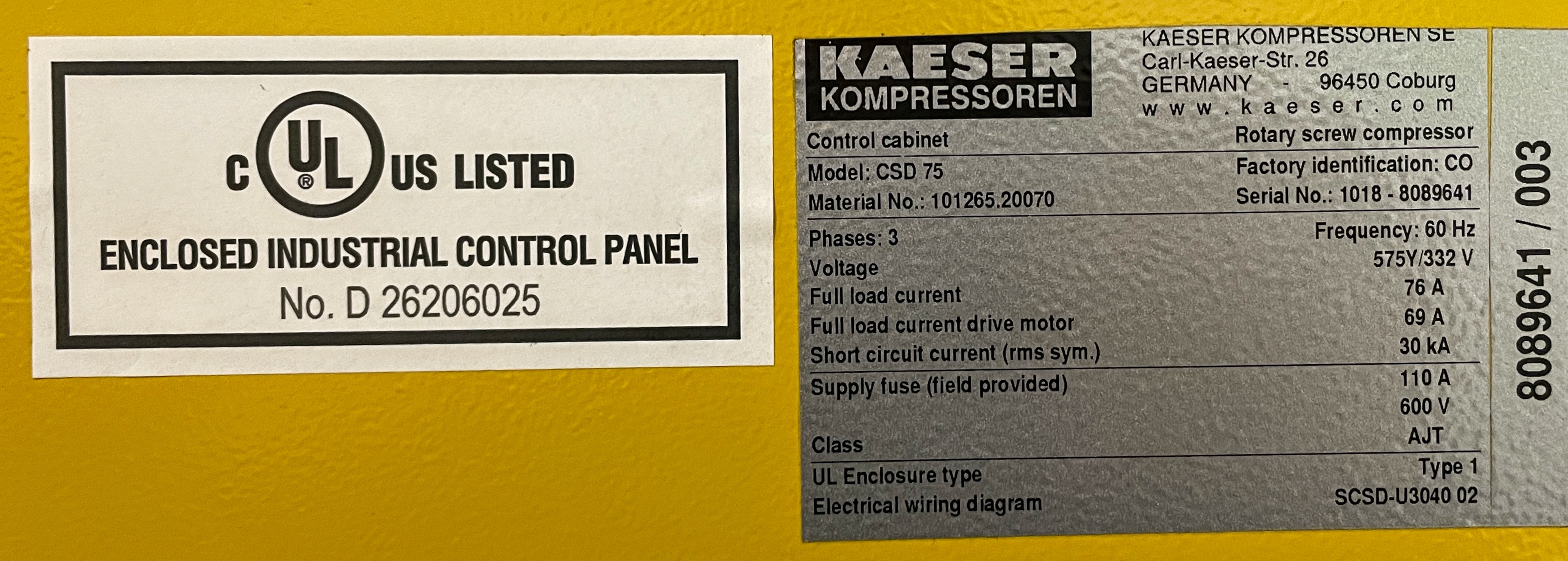 Close-up of a label on an industrial control panel showing UL certification and detailed technical specifications, including model number, voltage, frequency, current, and enclosure type.